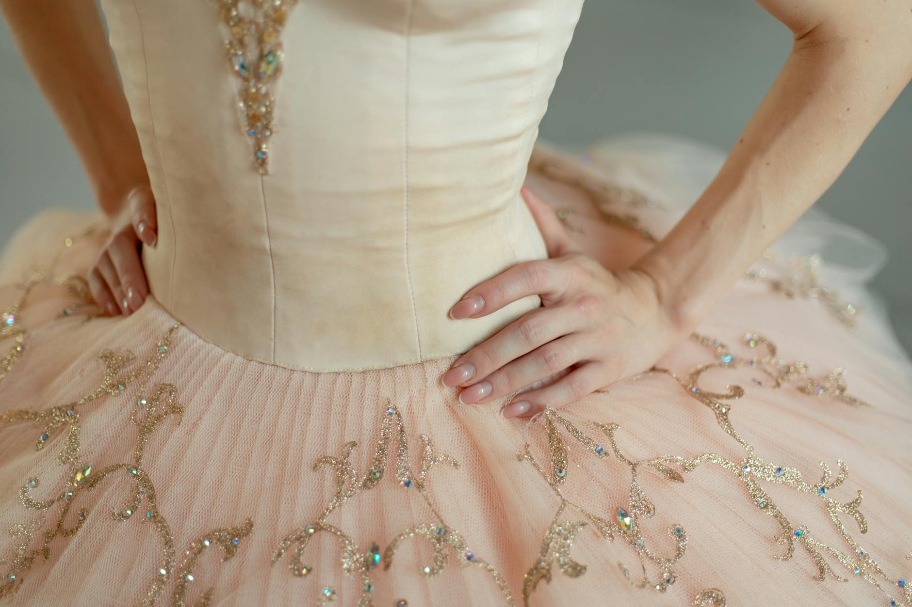 embroidery machine stitching a Cinderella design on fabric