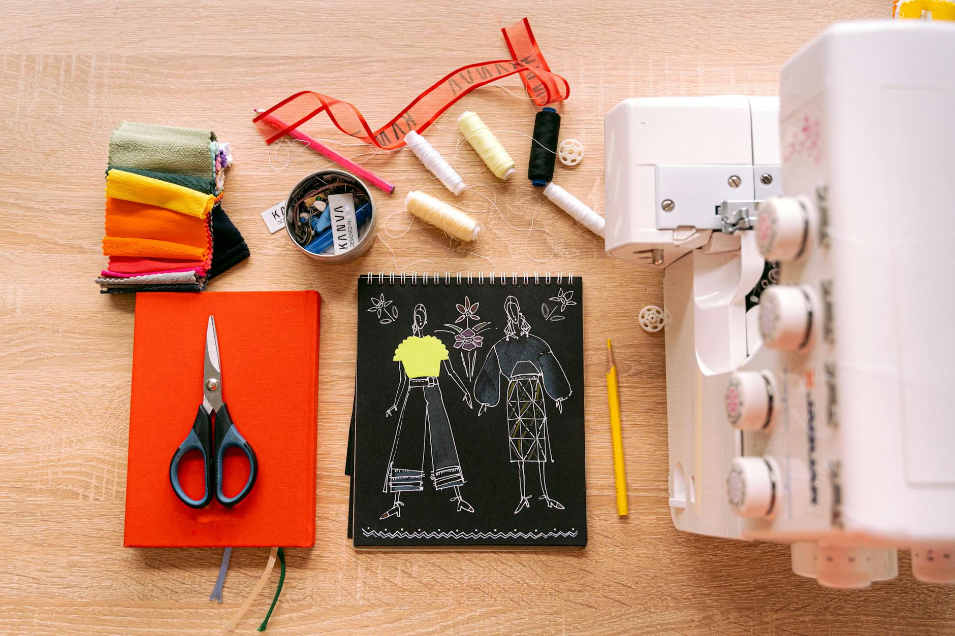 Embroidery machine stitching Packers design on fabric