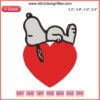 Cute Snoopy laying atop a heart embroidery design, perfect for Valentine's Day stitching projects. Ideal for DIY crafters.